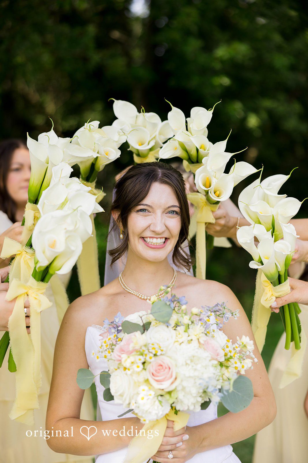 Ethan + Kelcy Bride portrait with white flowers