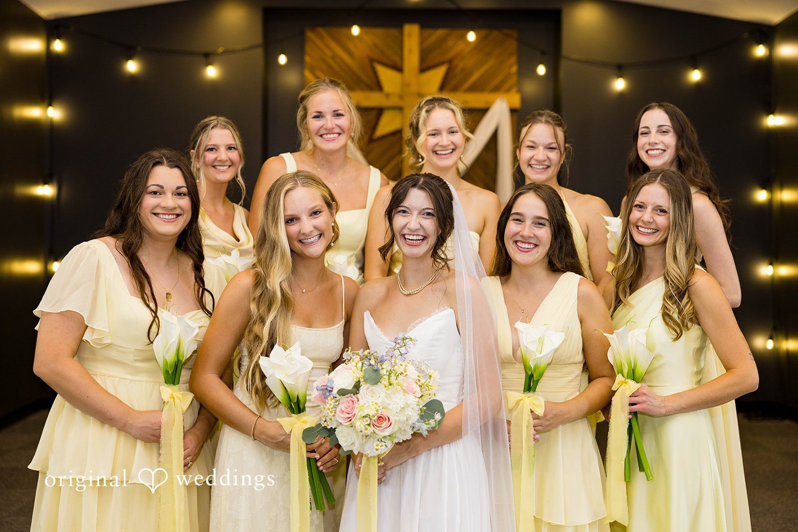 Ethan + Kelcy Bride with her bridesmaids inside the church at Grace Church Barberton