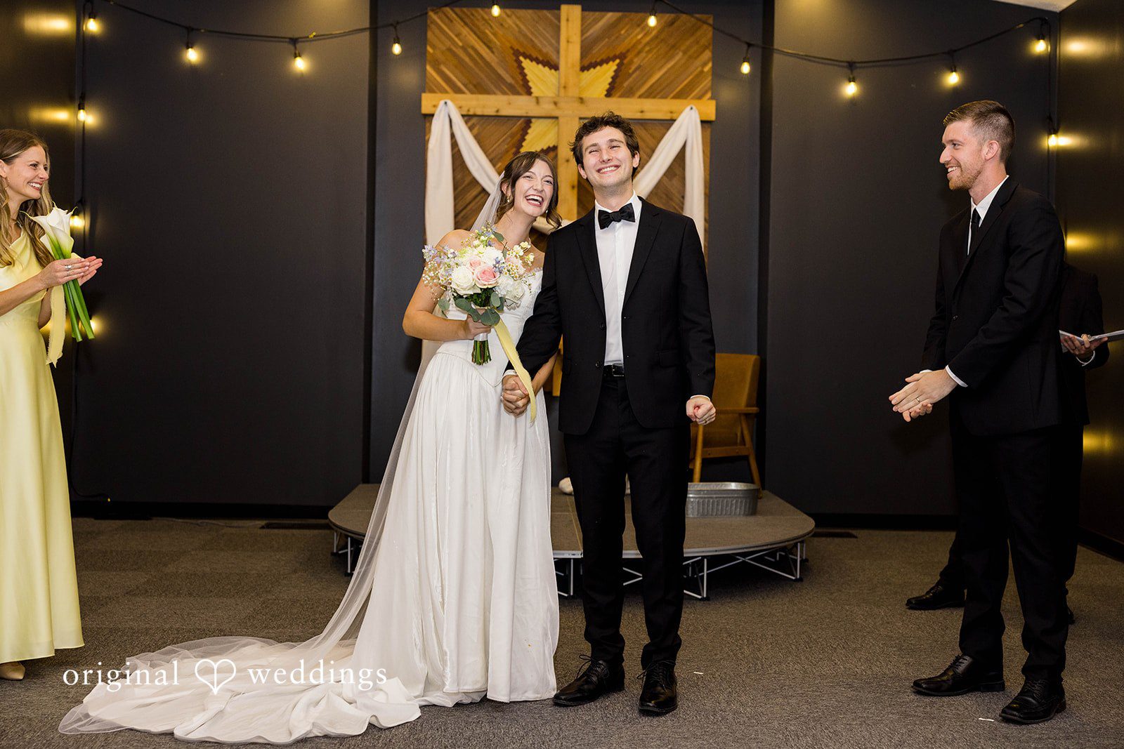 Ethan + Kelcy Couple at the altar during the ceremony at Grace Church Barberton