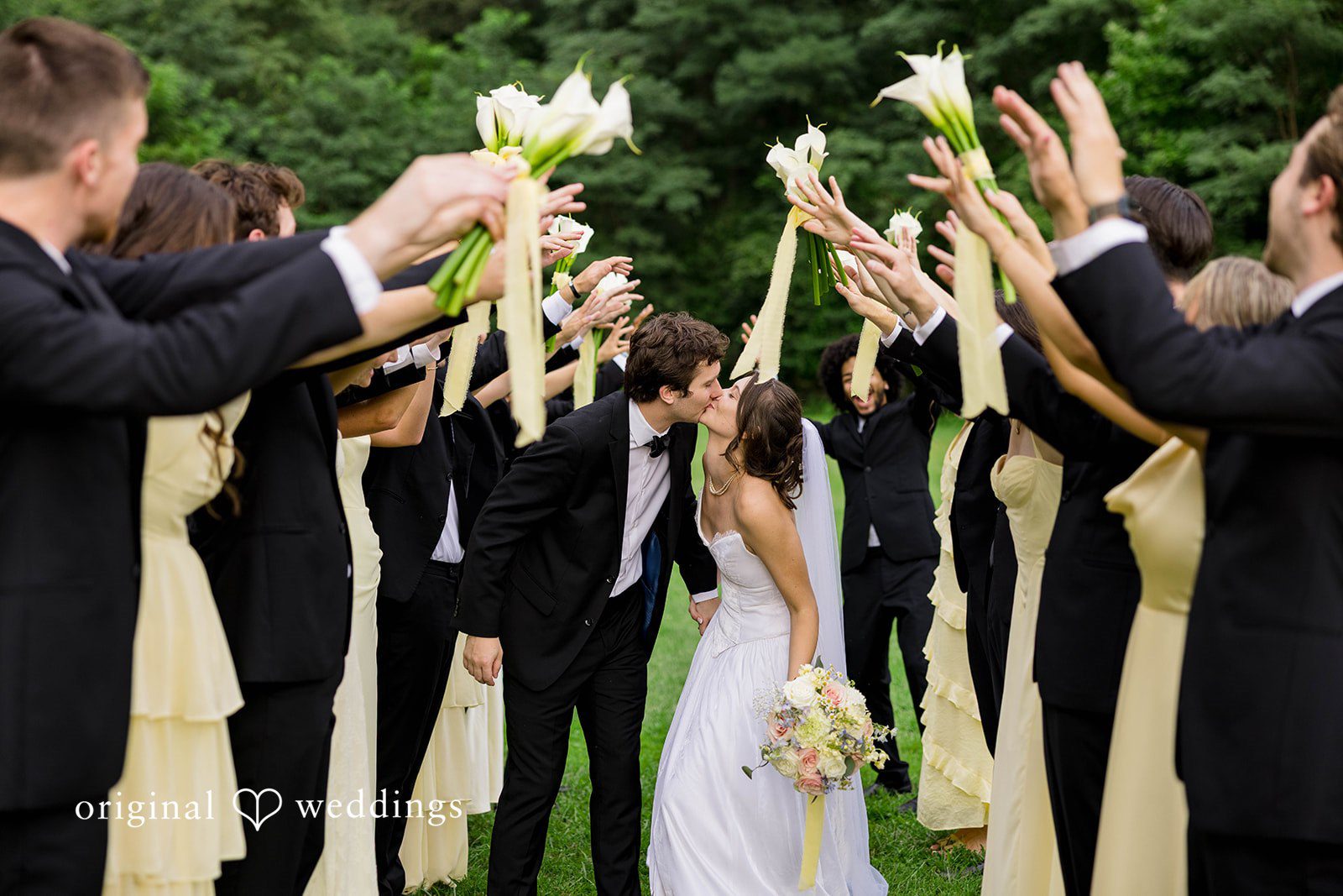 Ethan + Kelcy Wedding party cheering together