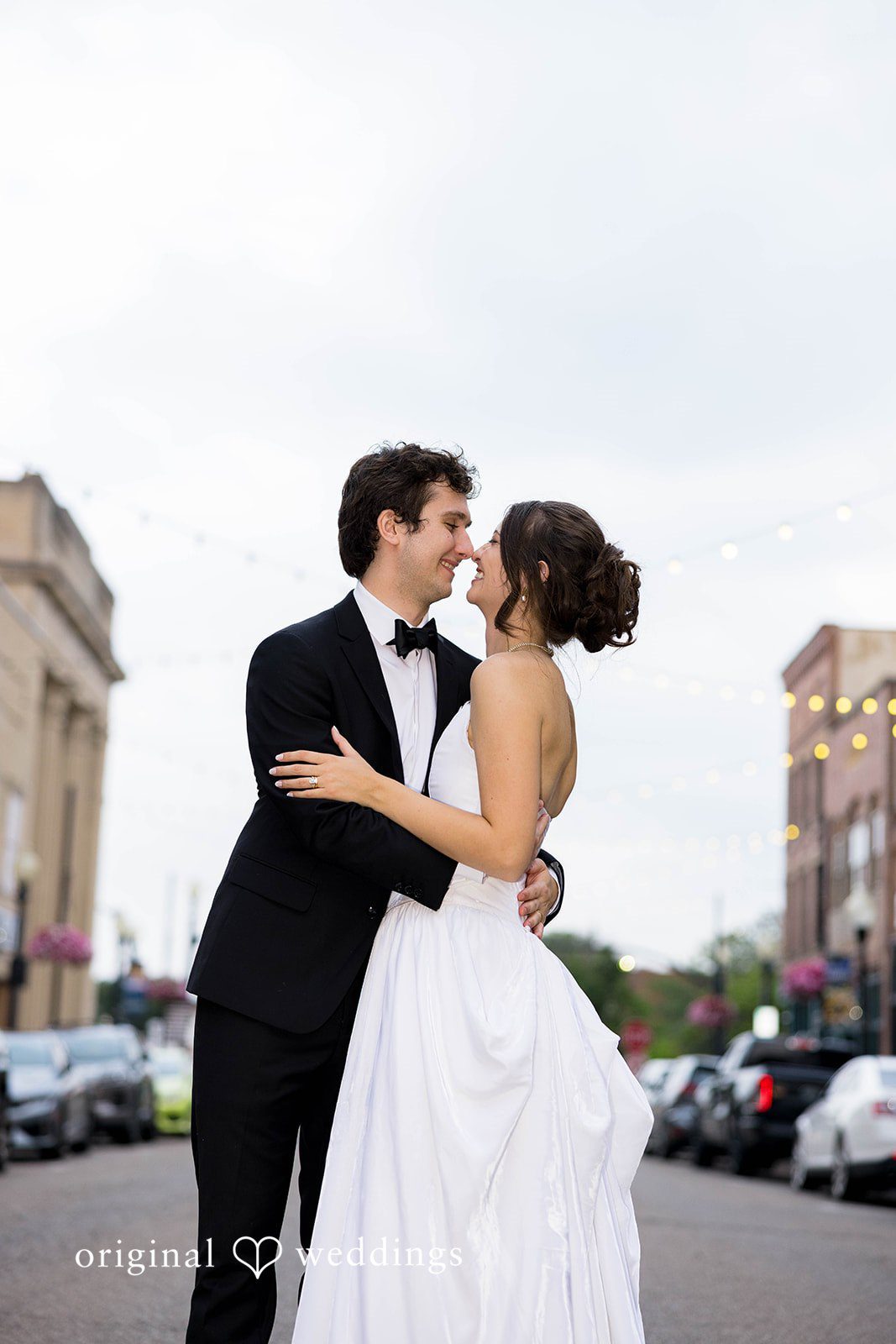 Ethan + Kelcy Couple sharing a kiss outdoors
