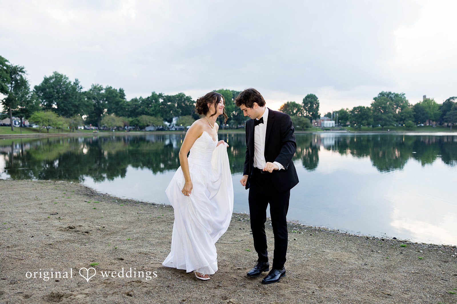 Ethan + Kelcy Couple standing together by the lake