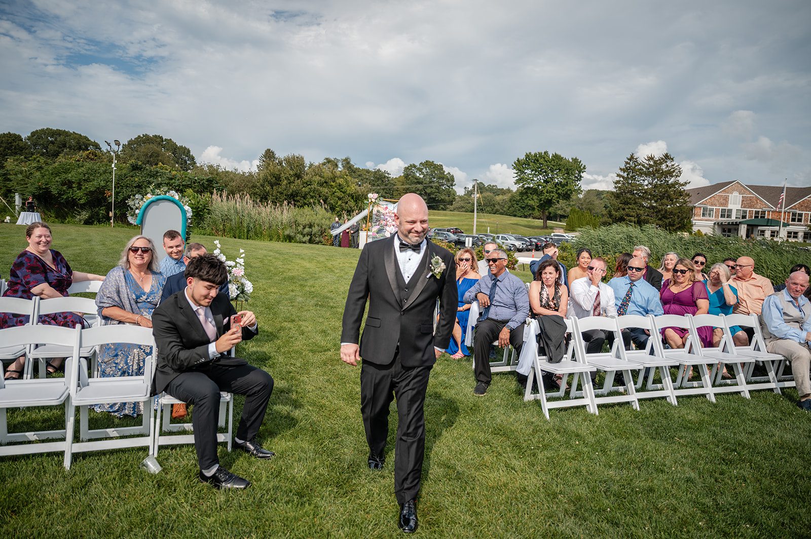harbor-lights-timeless-providence-feng-donald-p014-34 Groom walking down the aisle before the ceremony