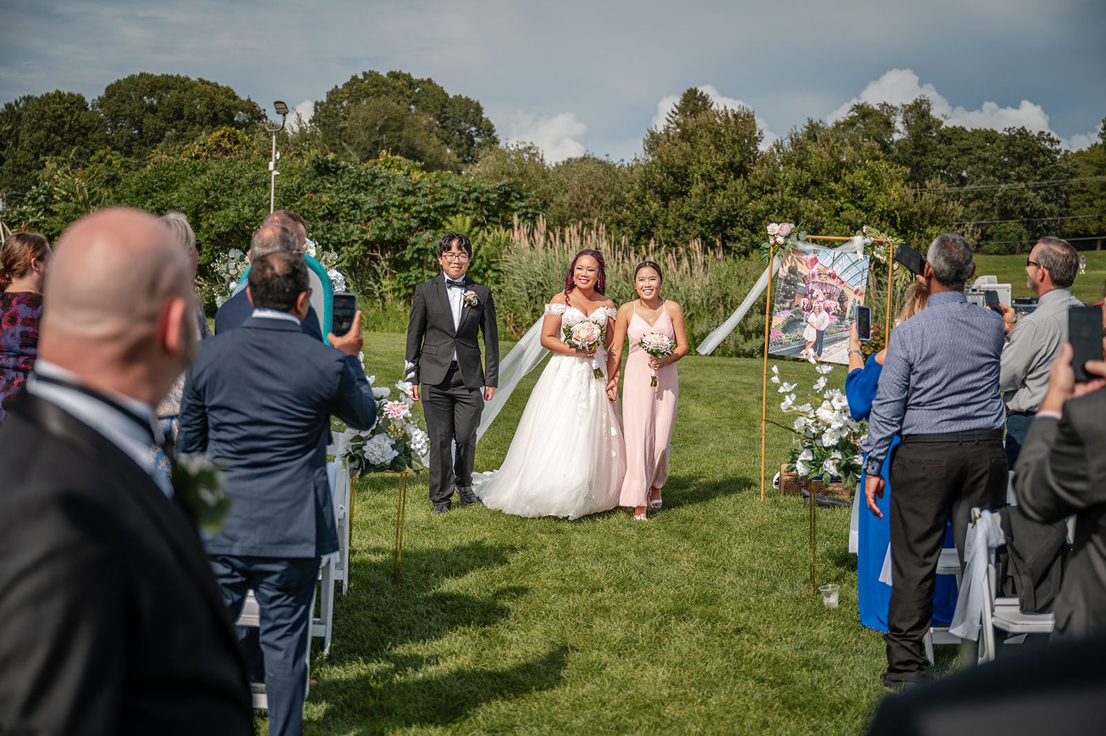 harbor-lights-timeless-providence-feng-donald-p015-42 Wedding party walking down the aisle