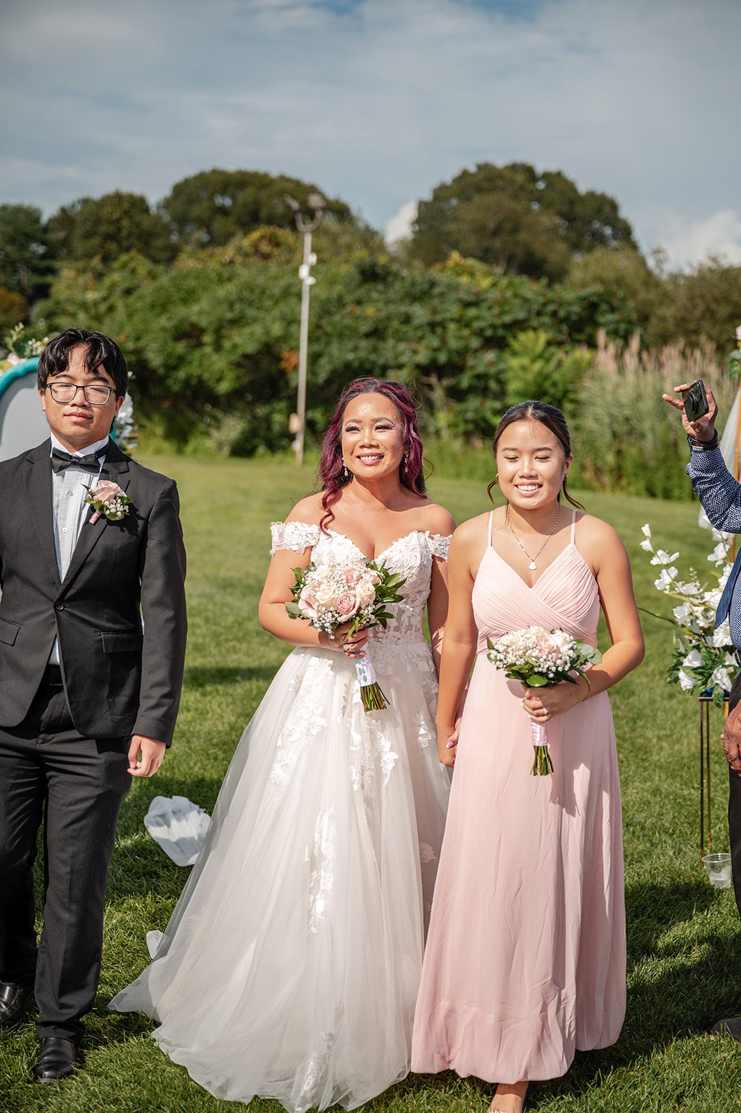 harbor-lights-timeless-providence-feng-donald-p016-10 Bridesmaids in blush dresses during the processional
