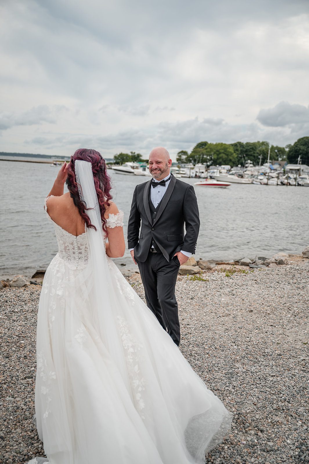 harbor-lights-timeless-providence-feng-donald-p032-05 Bride and groom on the rocky shoreline at Harbor Lights