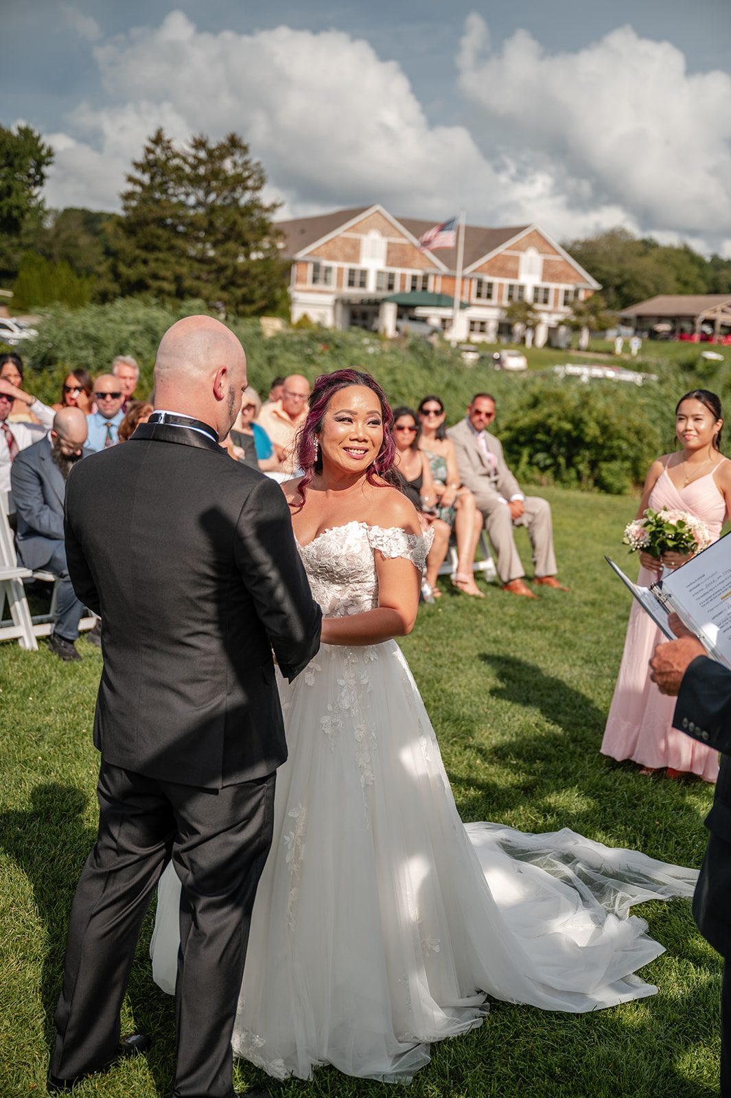 harbor-lights-timeless-providence-feng-donald-p044-49 Newlyweds walking among their guests