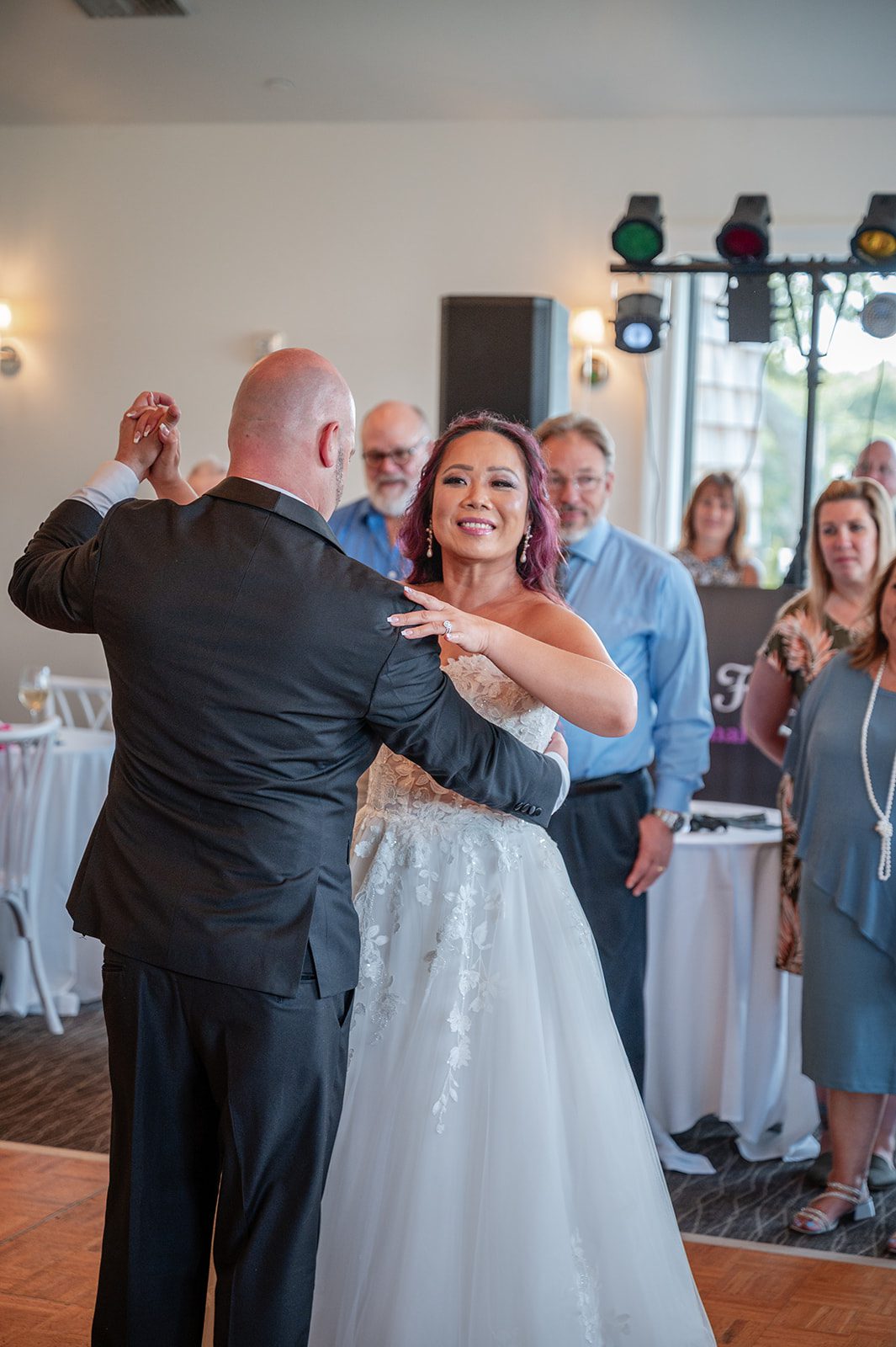 harbor-lights-timeless-providence-feng-donald-p049-04 Bride and groom sharing their first dance at Harbor Lights