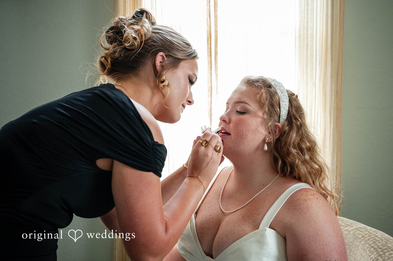 Bethany + Eddie Bride getting her makeup done