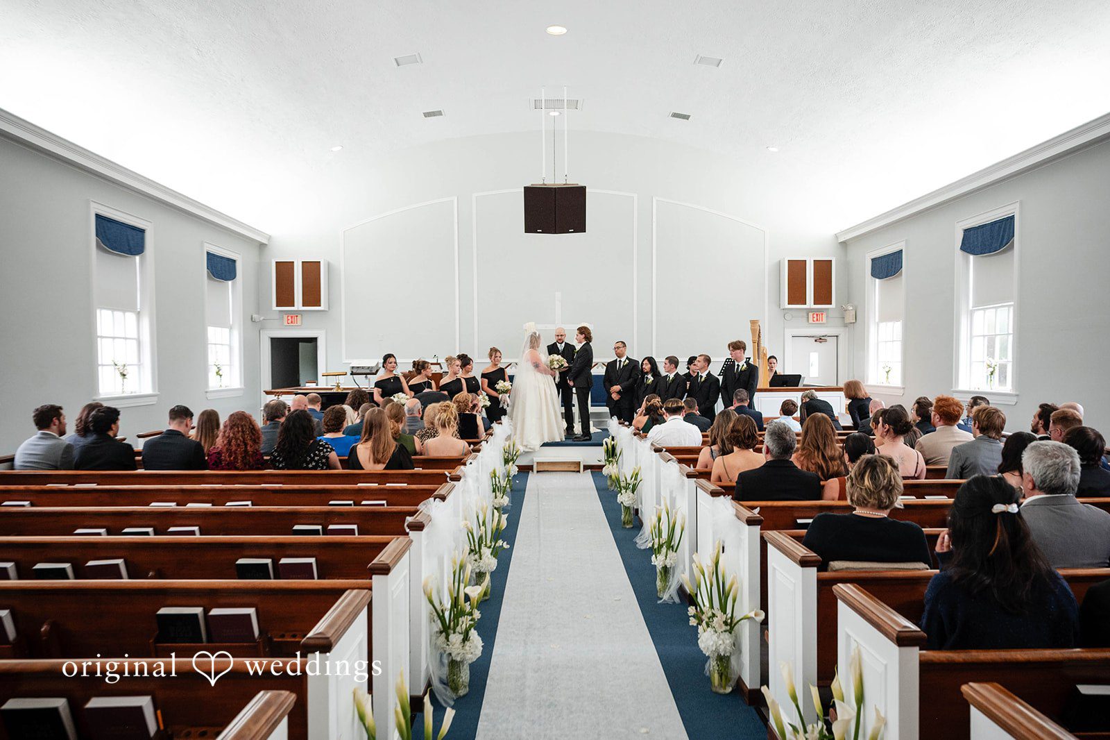 Bethany + Eddie Guests filling the pews for the ceremony at Immanuel Orthodox Presbyterian Church