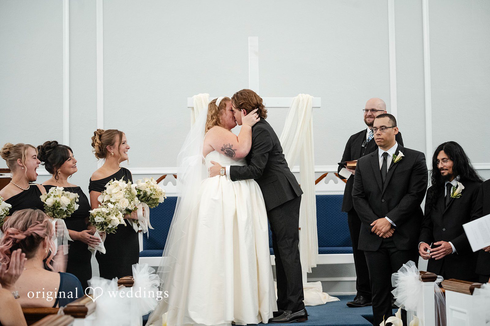 Bethany + Eddie Couple celebrating after the ceremony