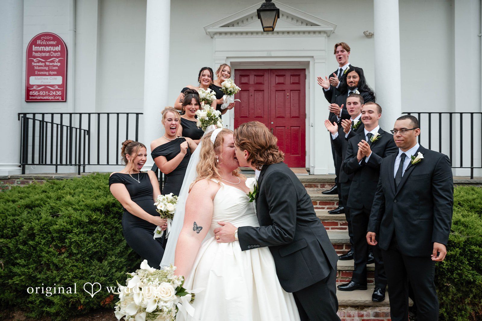 Bethany + Eddie Couple and friends on the church steps