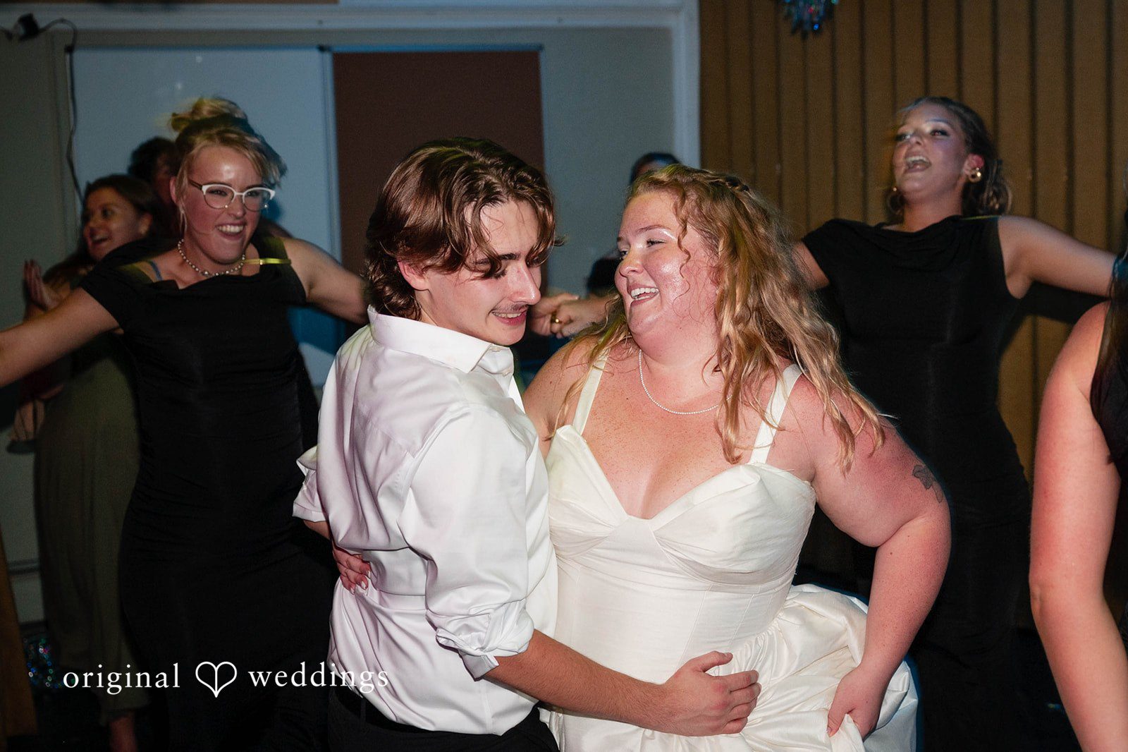 Bethany + Eddie Couple laughing with the bridesmaids