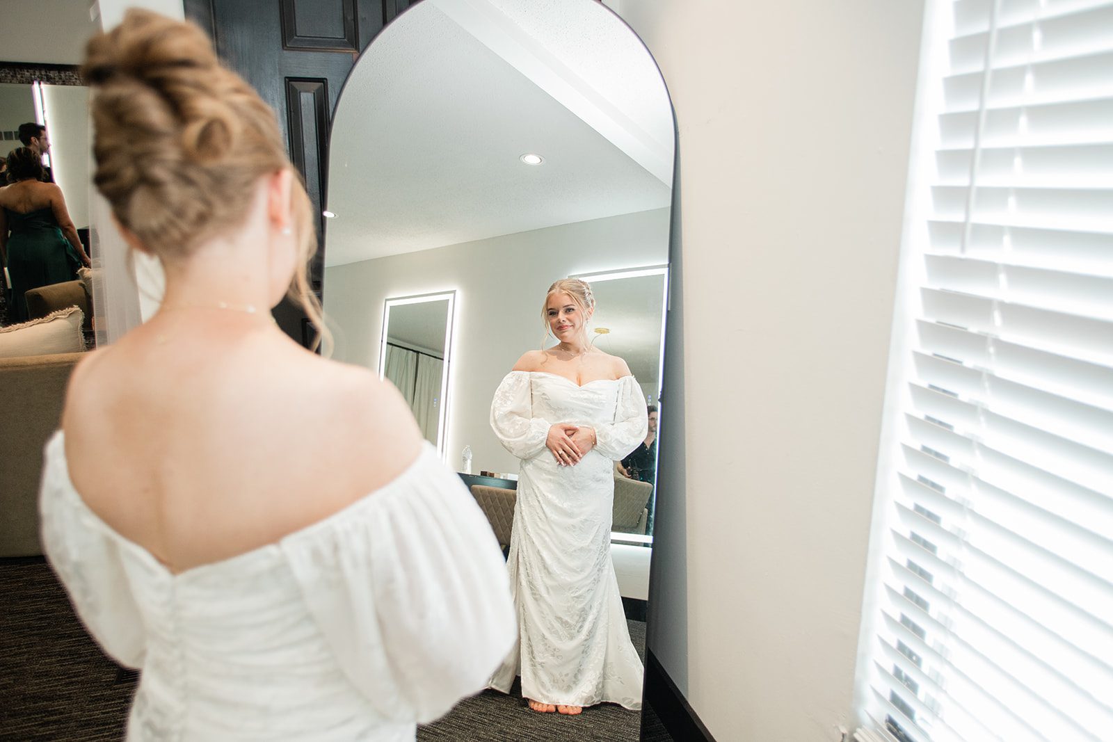 innsbrook-resort-airy-st-louis-sophia-brendan-p010-01 Bride getting ready in front of the mirror
