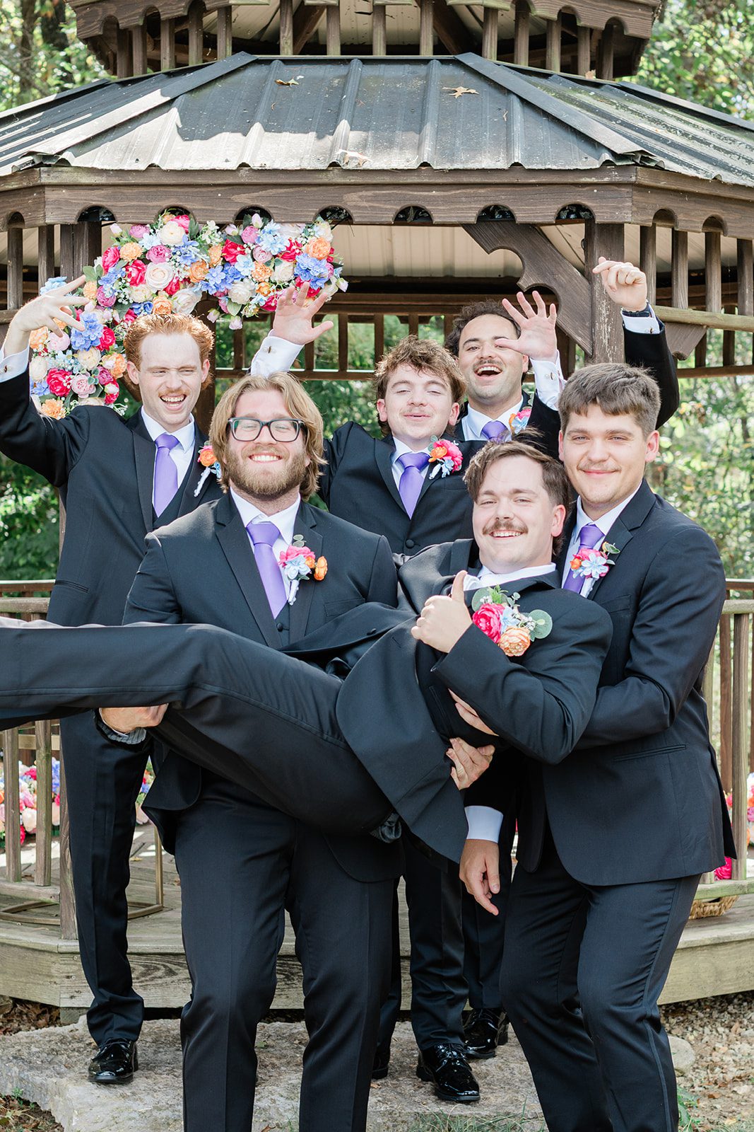 innsbrook-resort-airy-st-louis-sophia-brendan-p017-08 Groom with his groomsmen at the gazebo