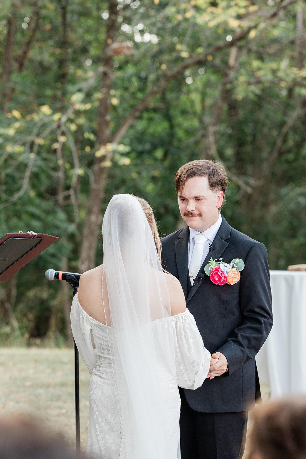 innsbrook-resort-airy-st-louis-sophia-brendan-p020-02 Couple sharing vows at the gazebo