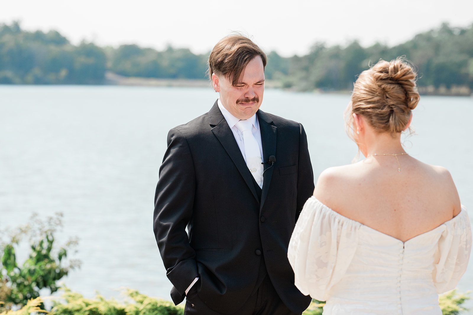 innsbrook-resort-airy-st-louis-sophia-brendan-p025-06 Groom seeing the bride for the first time by the water