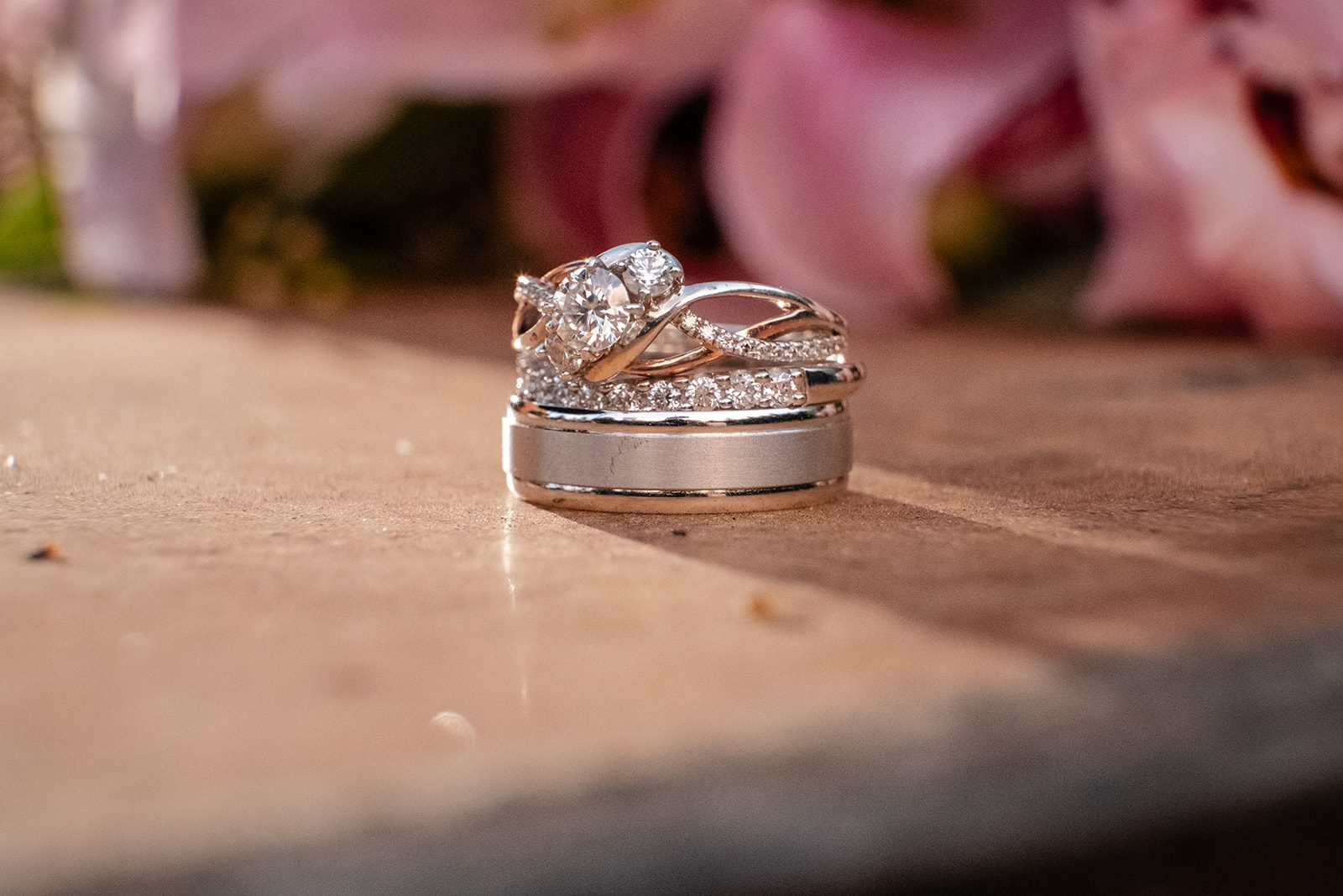 Wedding rings resting on a table Wedding rings resting on a table