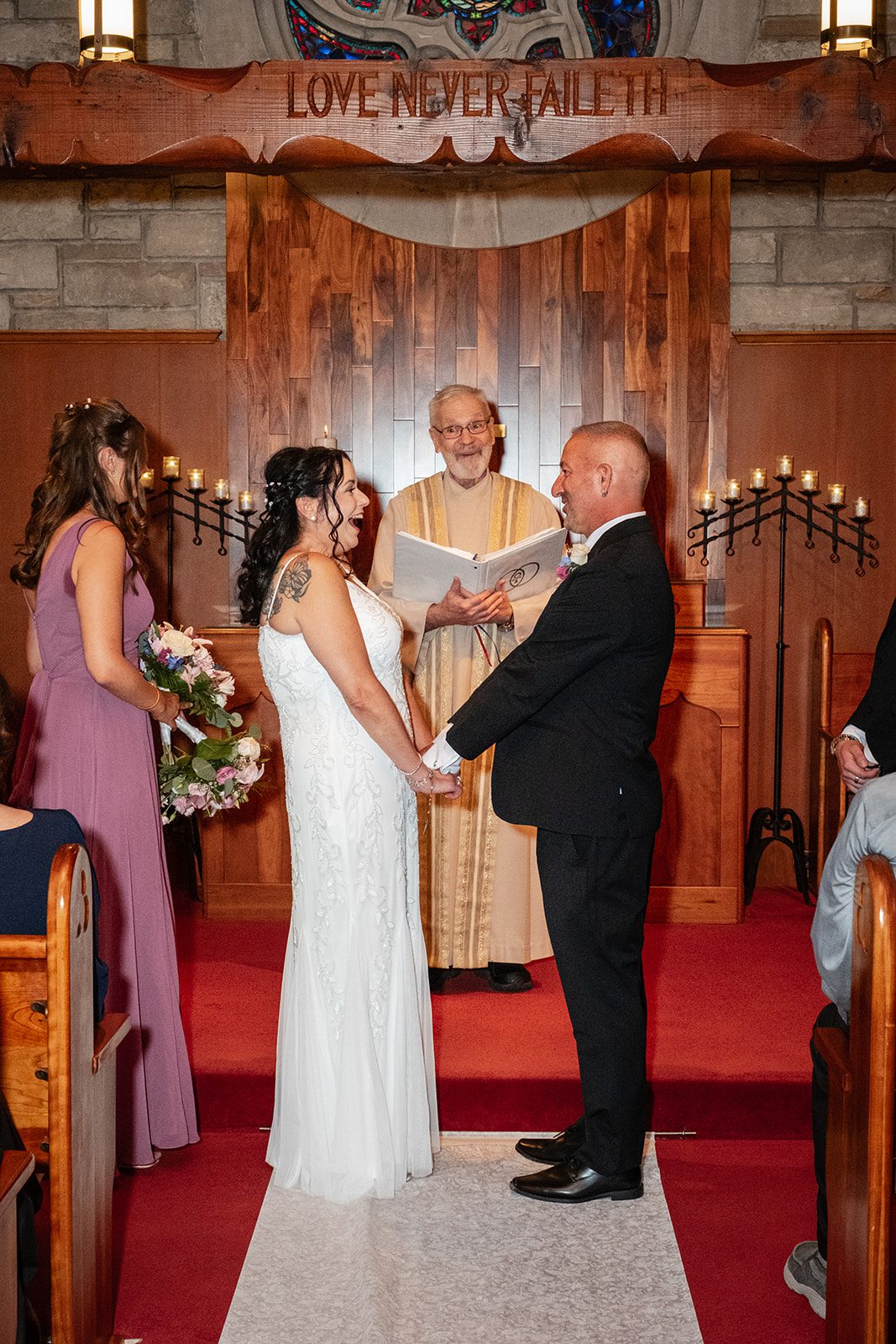 Couple sharing vows Couple sharing vows