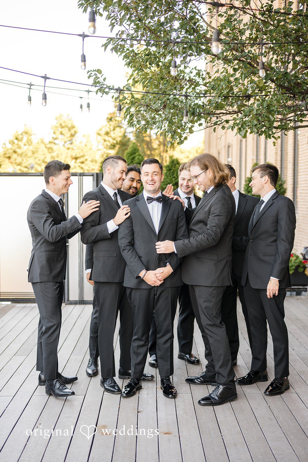 Michael + Haley Groomsmen on the rooftop deck at Lacuna Lofts