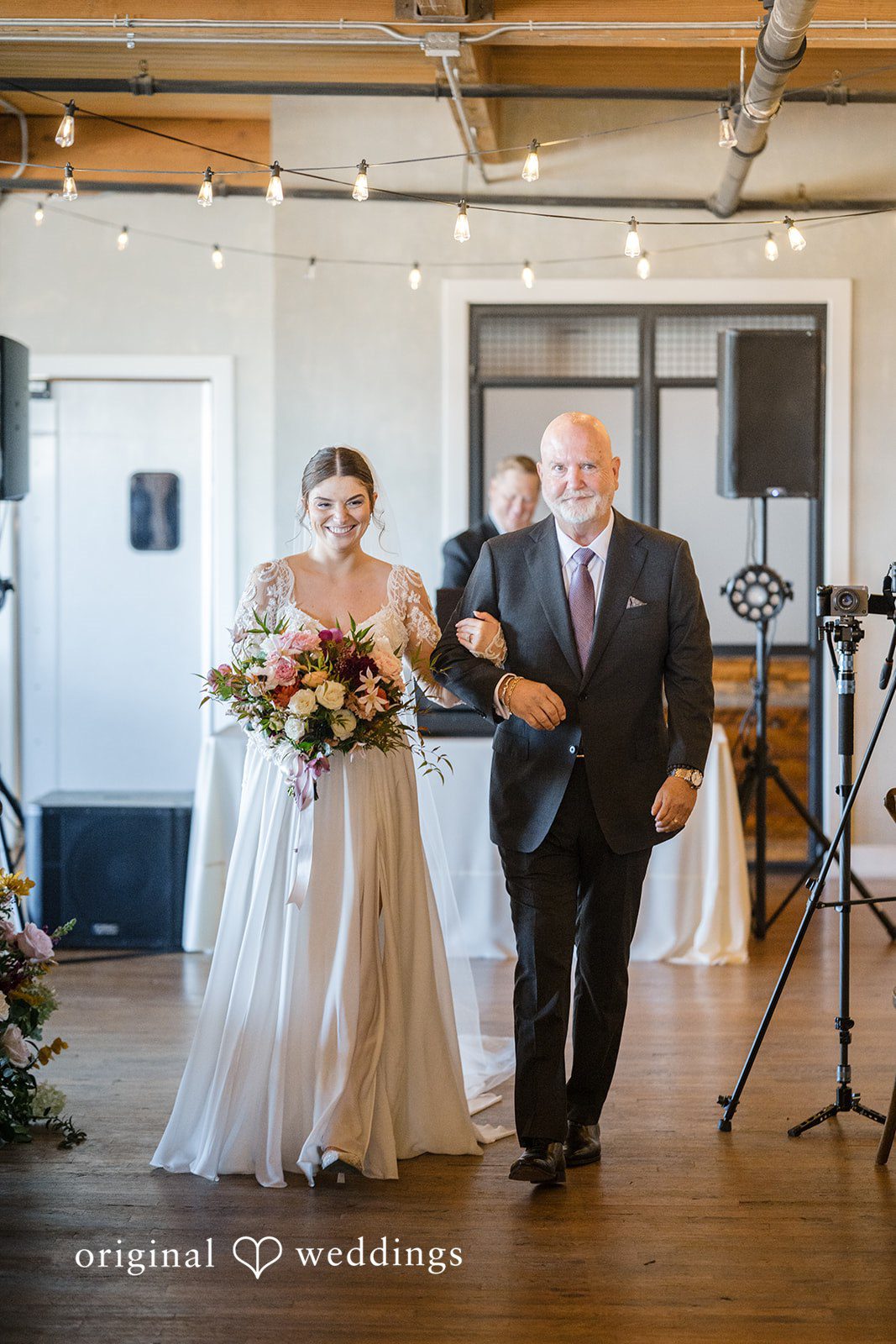 Michael + Haley Bride walking down the aisle with her father