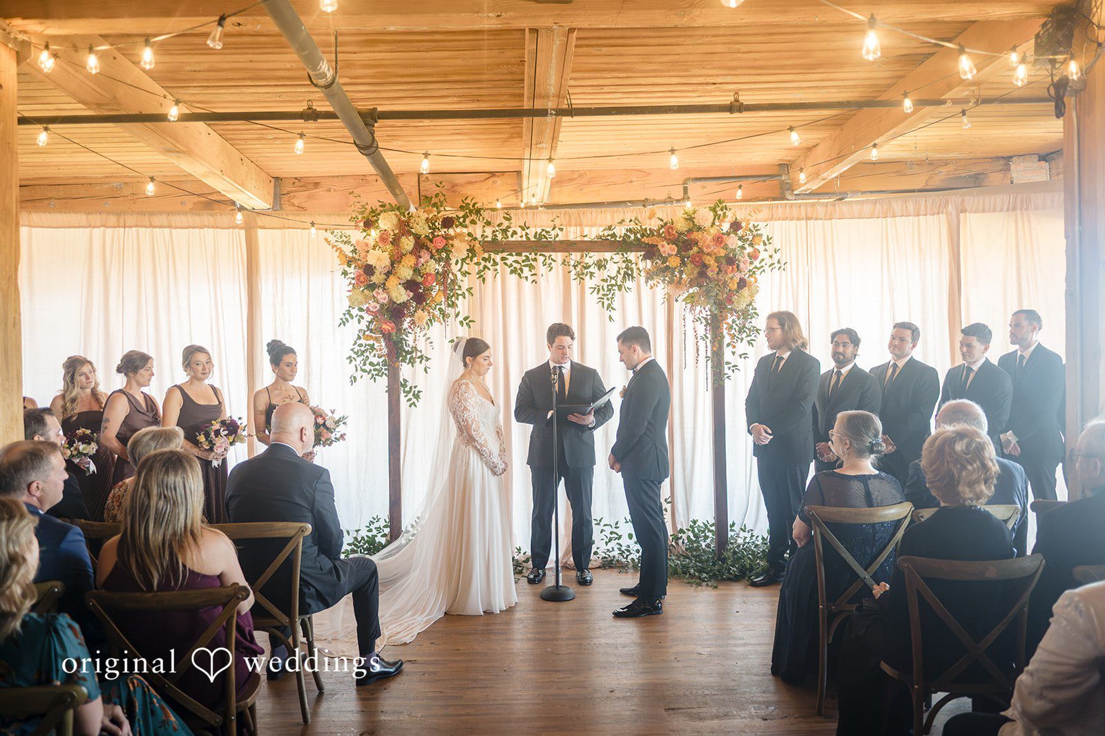 Michael + Haley Wide view of the indoor ceremony at Lacuna Lofts