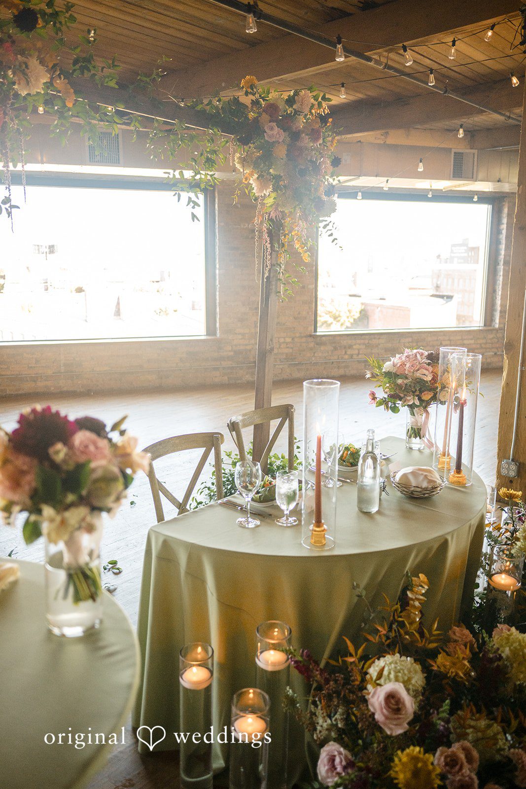 Michael + Haley Sweetheart table with florals