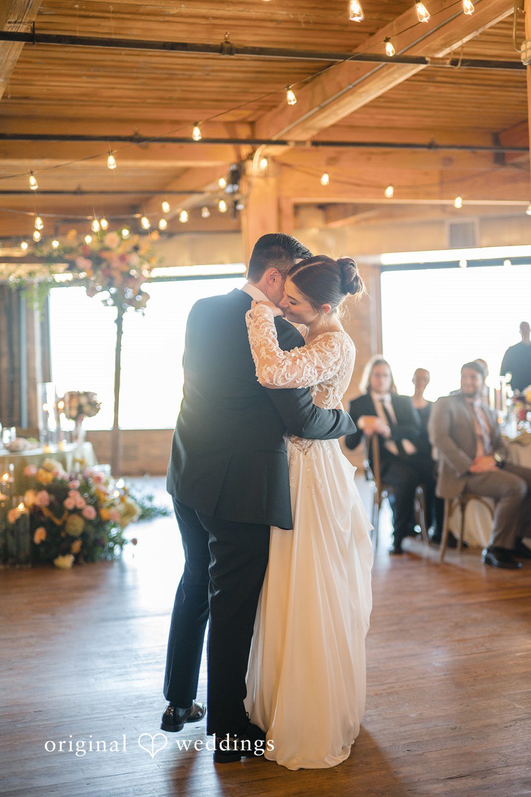 Michael + Haley Couple sharing their first dance at Lacuna Lofts