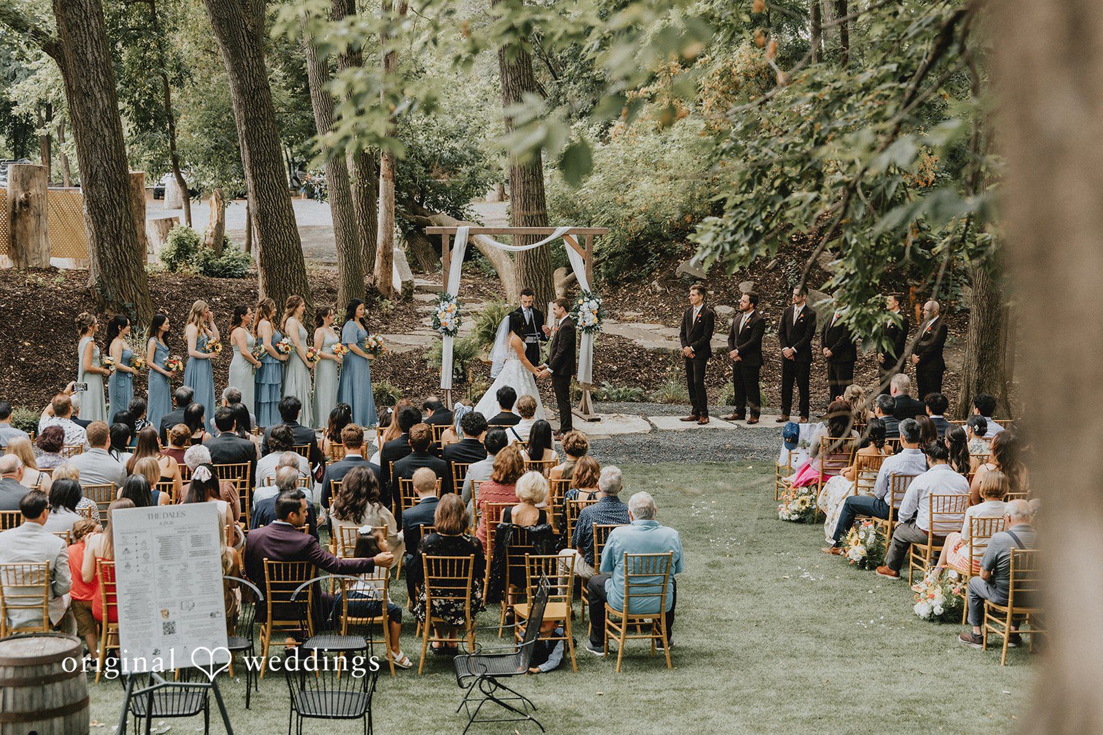 Jake + Ida Ida and Jake during the ceremony at Lake Vadnais Grand Events