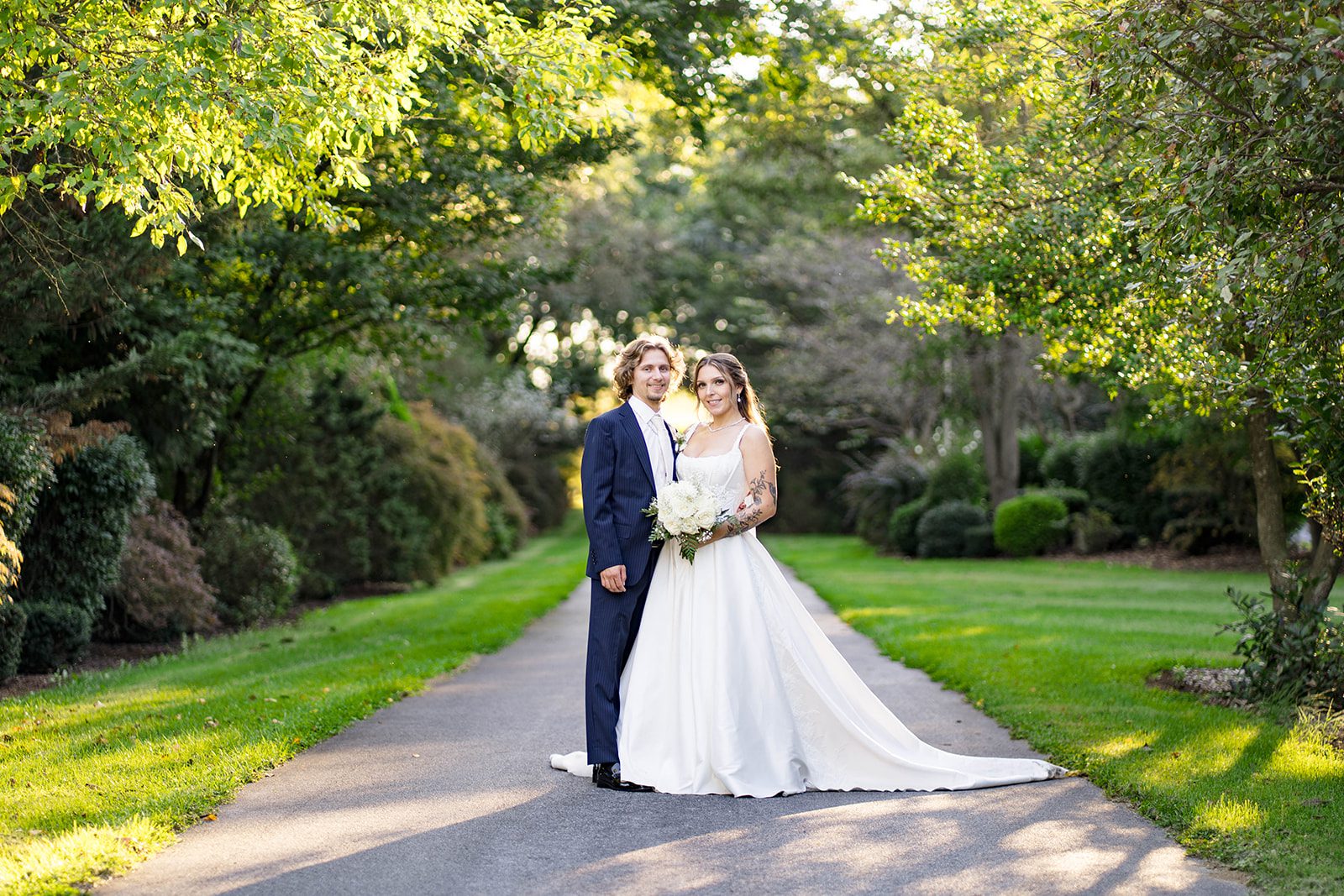 linwood-estate-timeless-baltimore-autumn-dylan-036-44 Bride and groom on the garden path, captured by Baltimore wedding photographers from Original Weddings at Linwood Estate