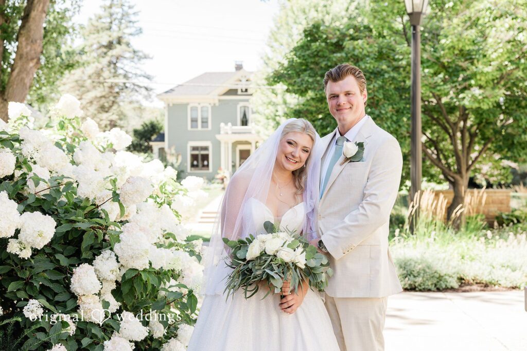 Claire + Alex Our Minneapolis wedding photographers captured a stunning portrait of the couple outdoors