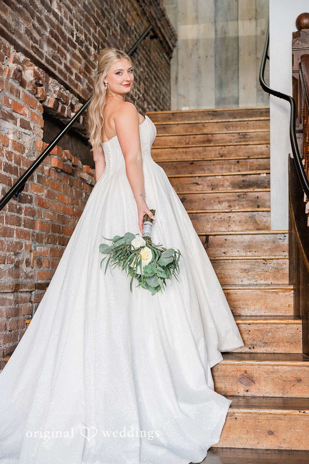 Claire + Alex A beautiful portrait of the bride by the stairs