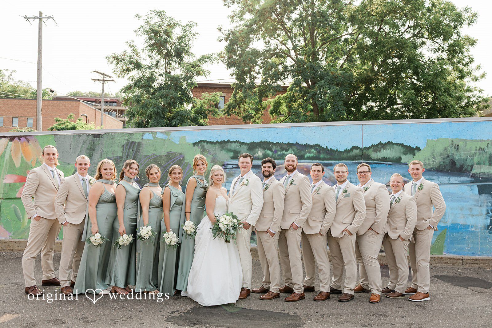 Claire + Alex Our Minneapolis wedding photographers captured a beautiful portrait of the couple and their bridal party