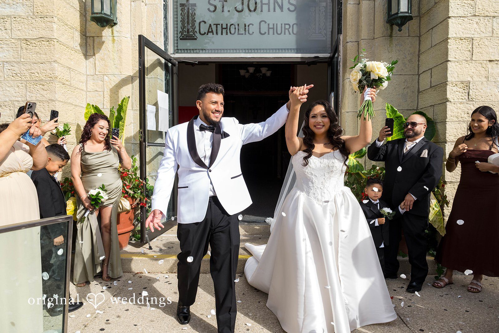 September 12, 2026 – Sierra & Arturo – (ID-4123) Couple walking out of the church as guests cheer