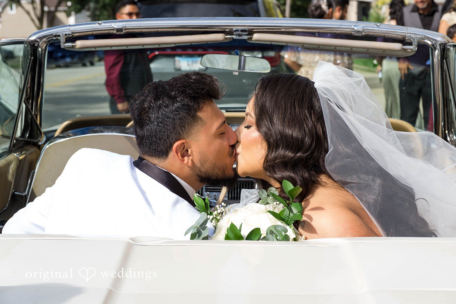 September 12, 2026 – Sierra & Arturo – (ID-4123) Couple kissing in the vintage convertible