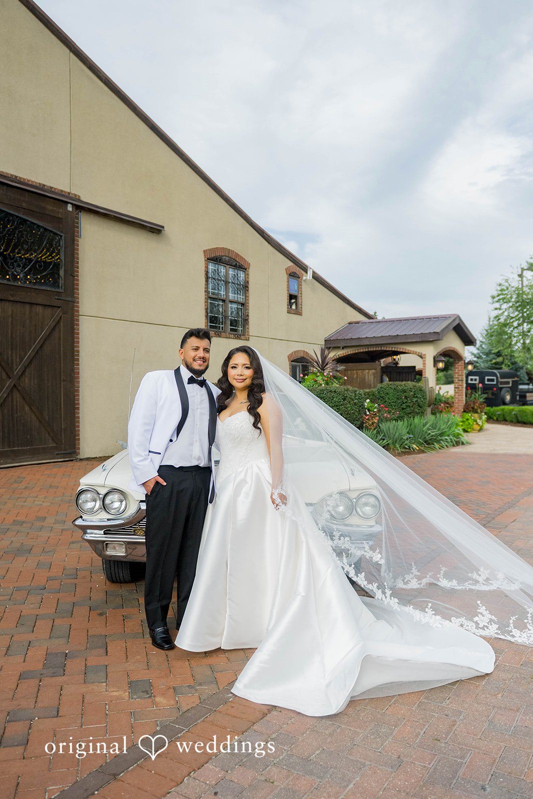 September 12, 2026 – Sierra & Arturo – (ID-4123) Couple standing by the barn at Rancho Los Guzman