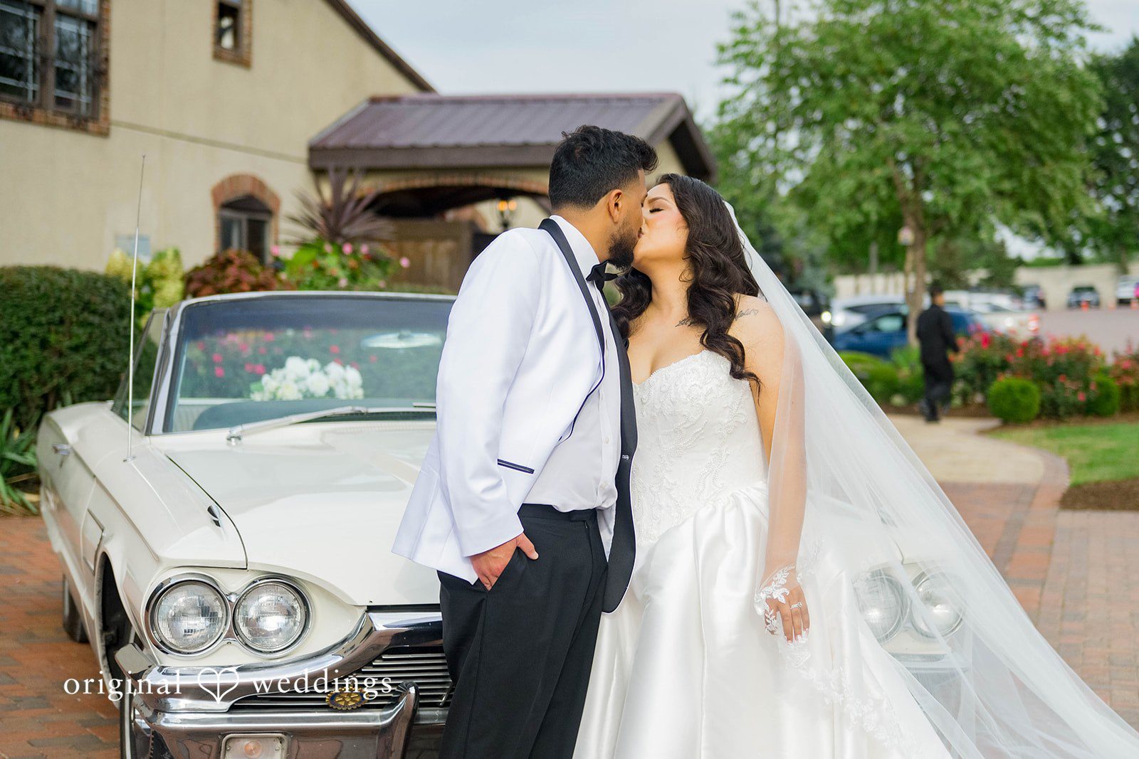 September 12, 2026 – Sierra & Arturo – (ID-4123) Bride and groom leaning on a vintage car at Rancho Los Guzman
