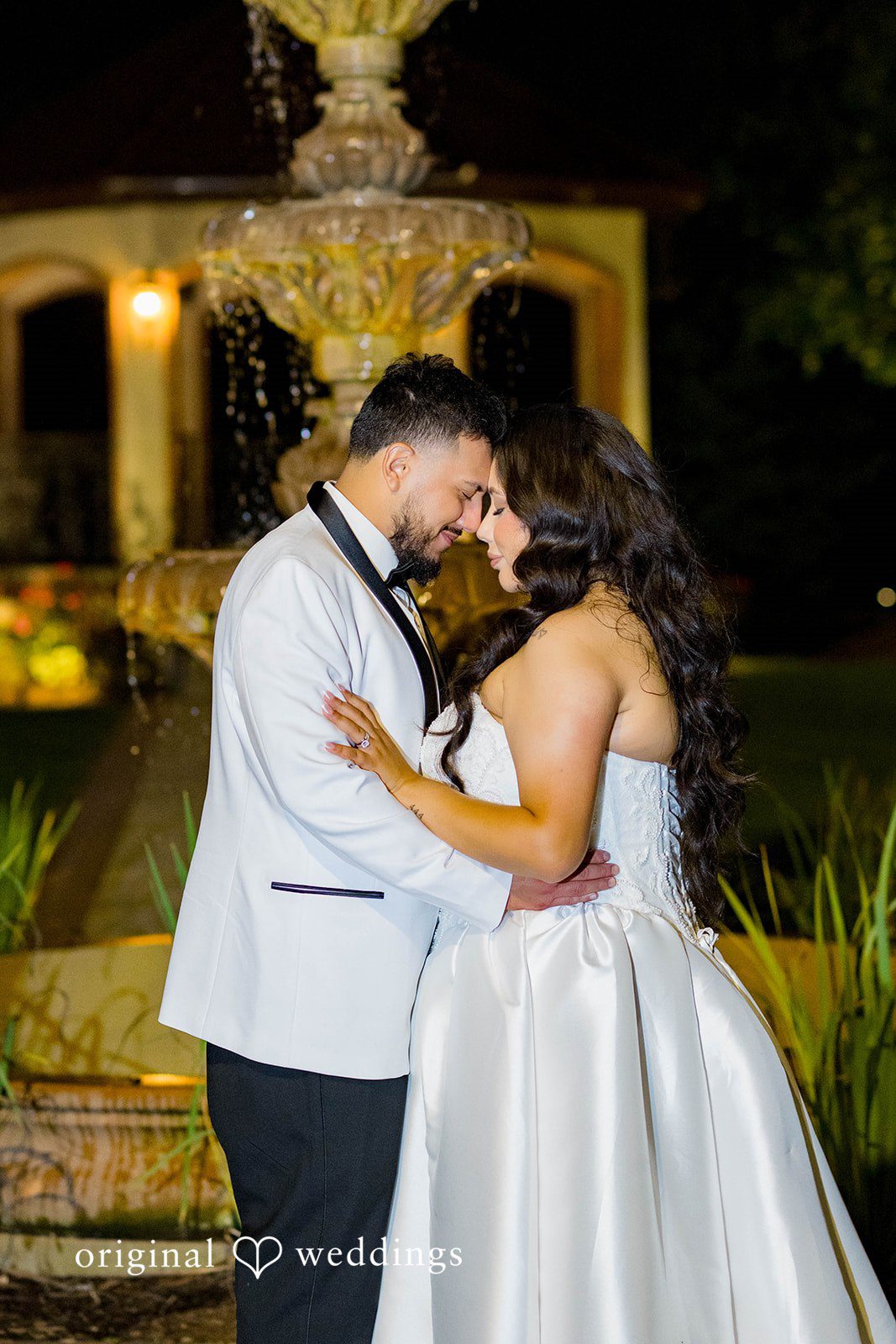 September 12, 2026 – Sierra & Arturo – (ID-4123) Bride and groom embracing after dark at Rancho Los Guzman