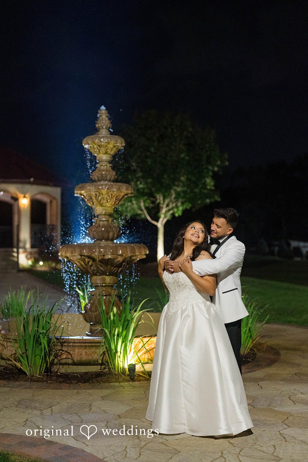 September 12, 2026 – Sierra & Arturo – (ID-4123) Couple by the lit fountain at night at Rancho Los Guzman