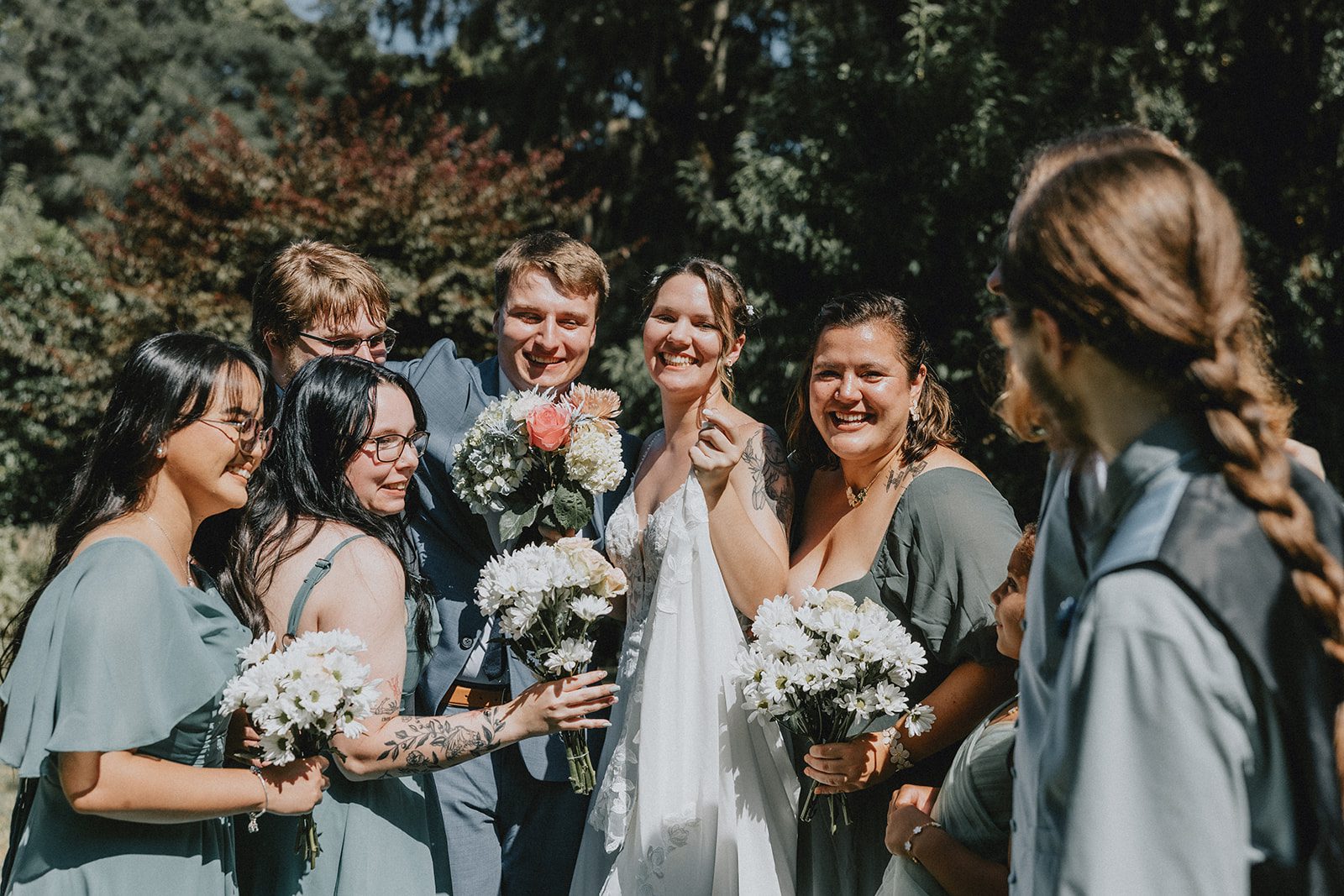 Bride with her bridesmaids in sage green Bride with her bridesmaids in sage green