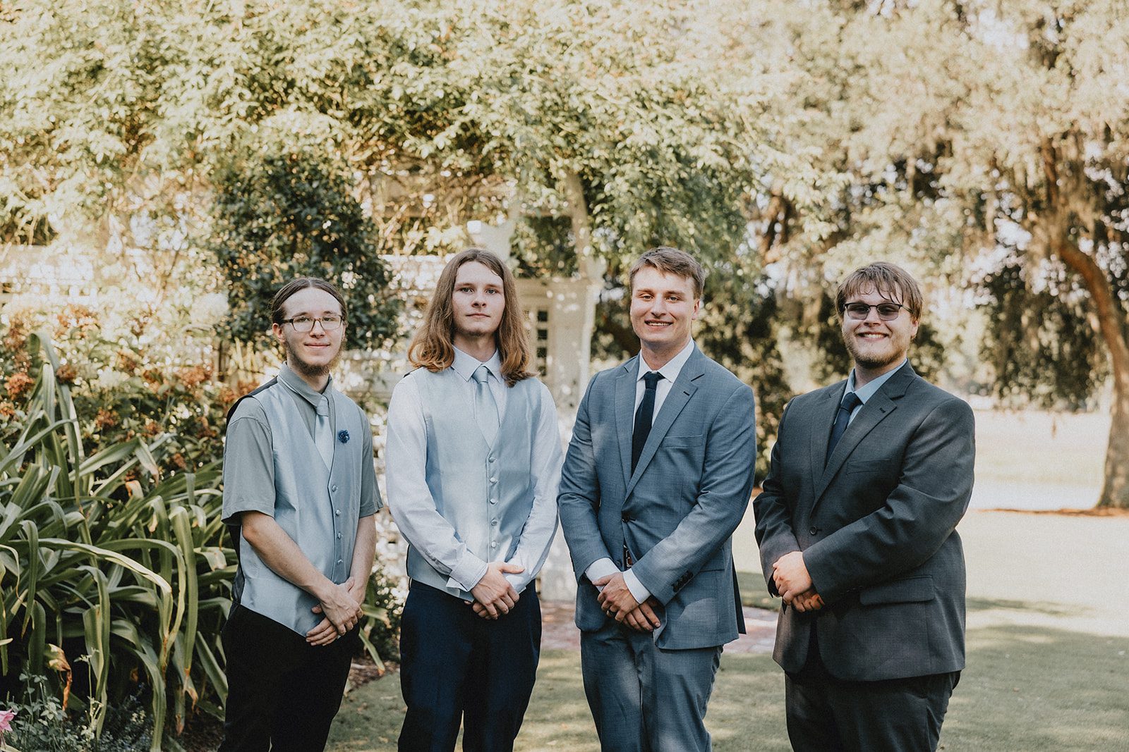 Groom with his groomsmen in the garden Groom with his groomsmen in the garden