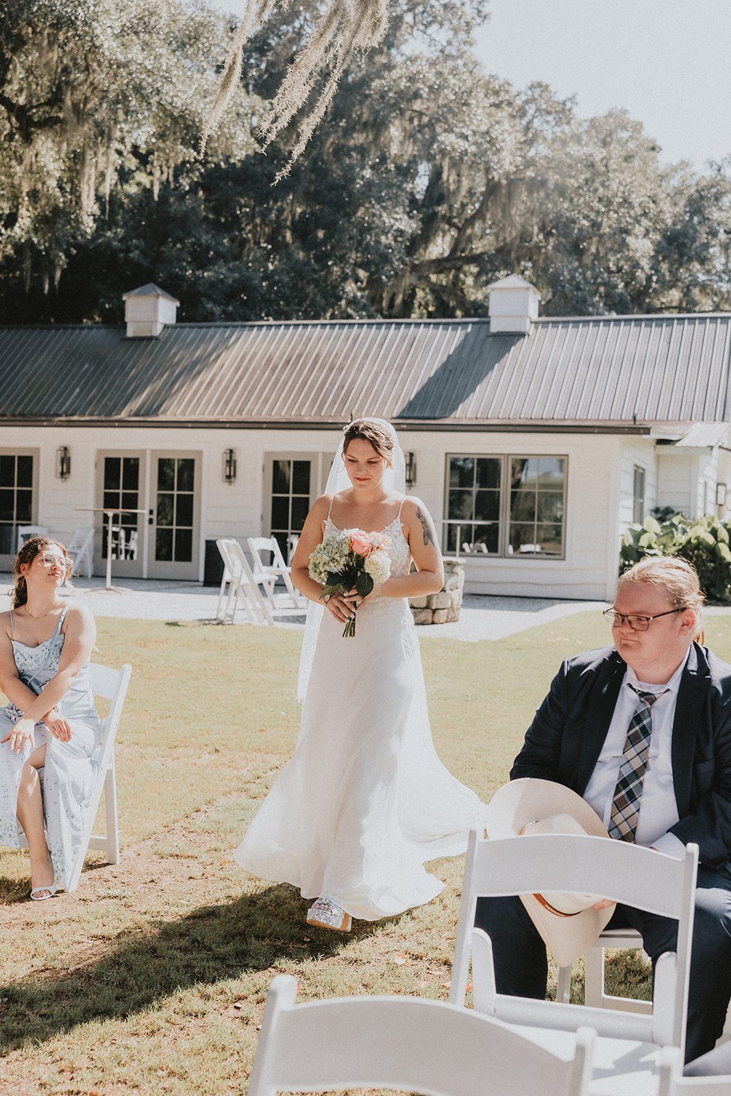 Ceremony under the oak trees at Magnolia Plantation and Gardens Ceremony under the oak trees at Magnolia Plantation and Gardens