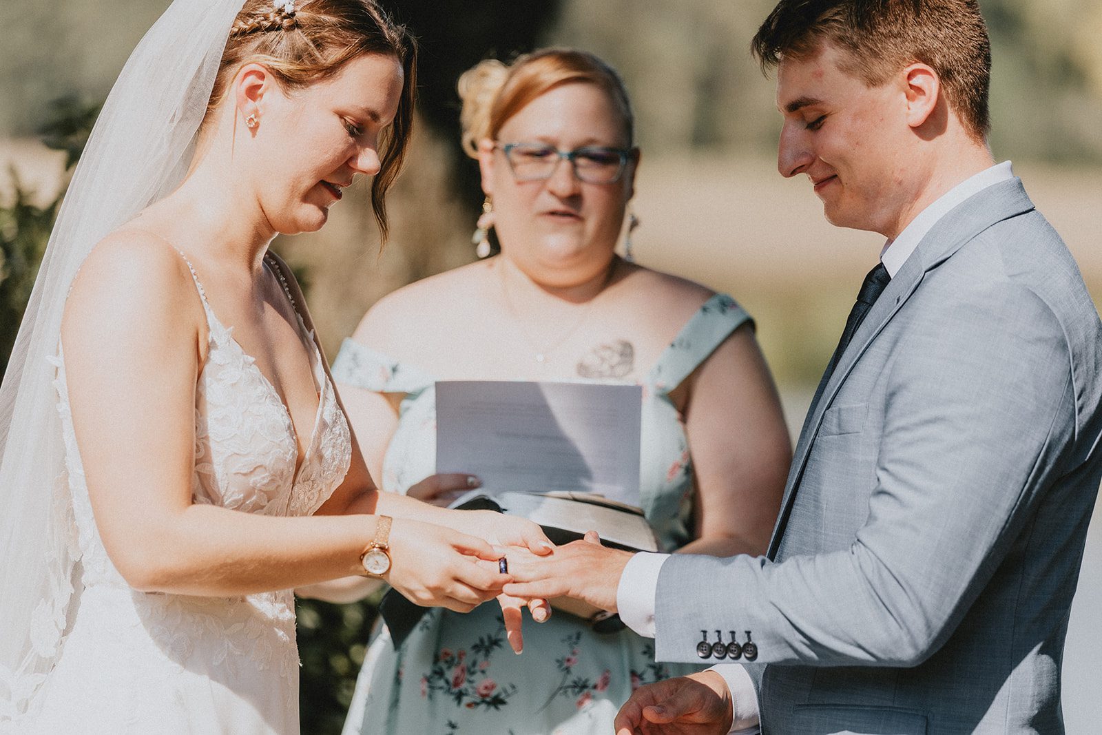 Ring exchange at the ceremony Ring exchange at the ceremony