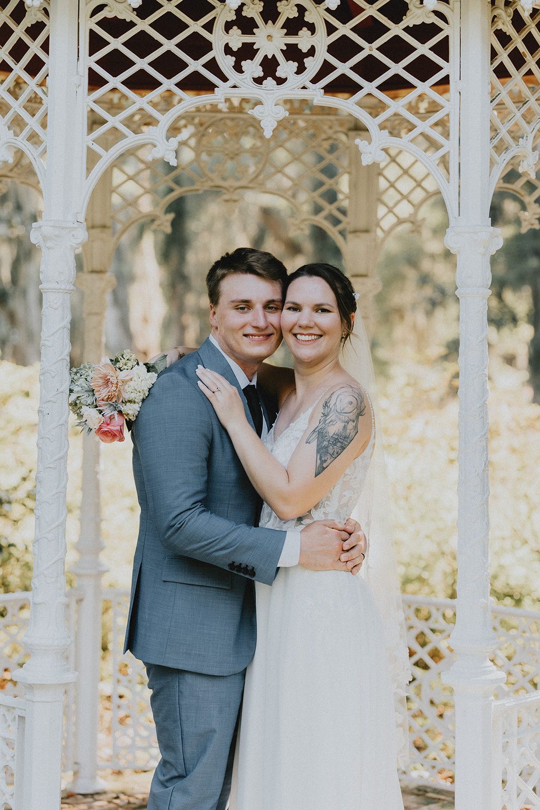 Couple smiling inside the gazebo at Magnolia Plantation and Gardens Couple smiling inside the gazebo at Magnolia Plantation and Gardens