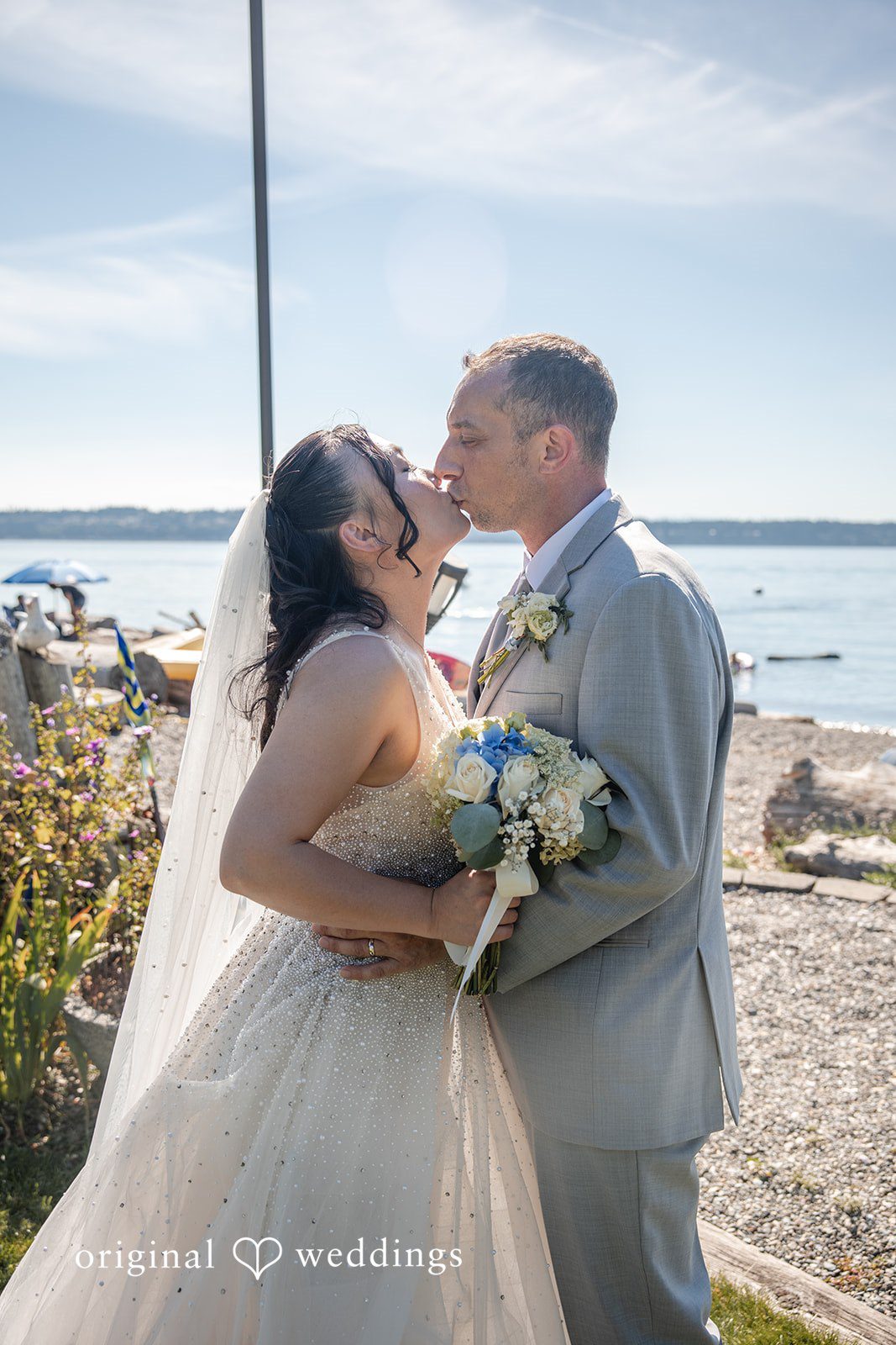 Kelly + John Couple sharing a kiss