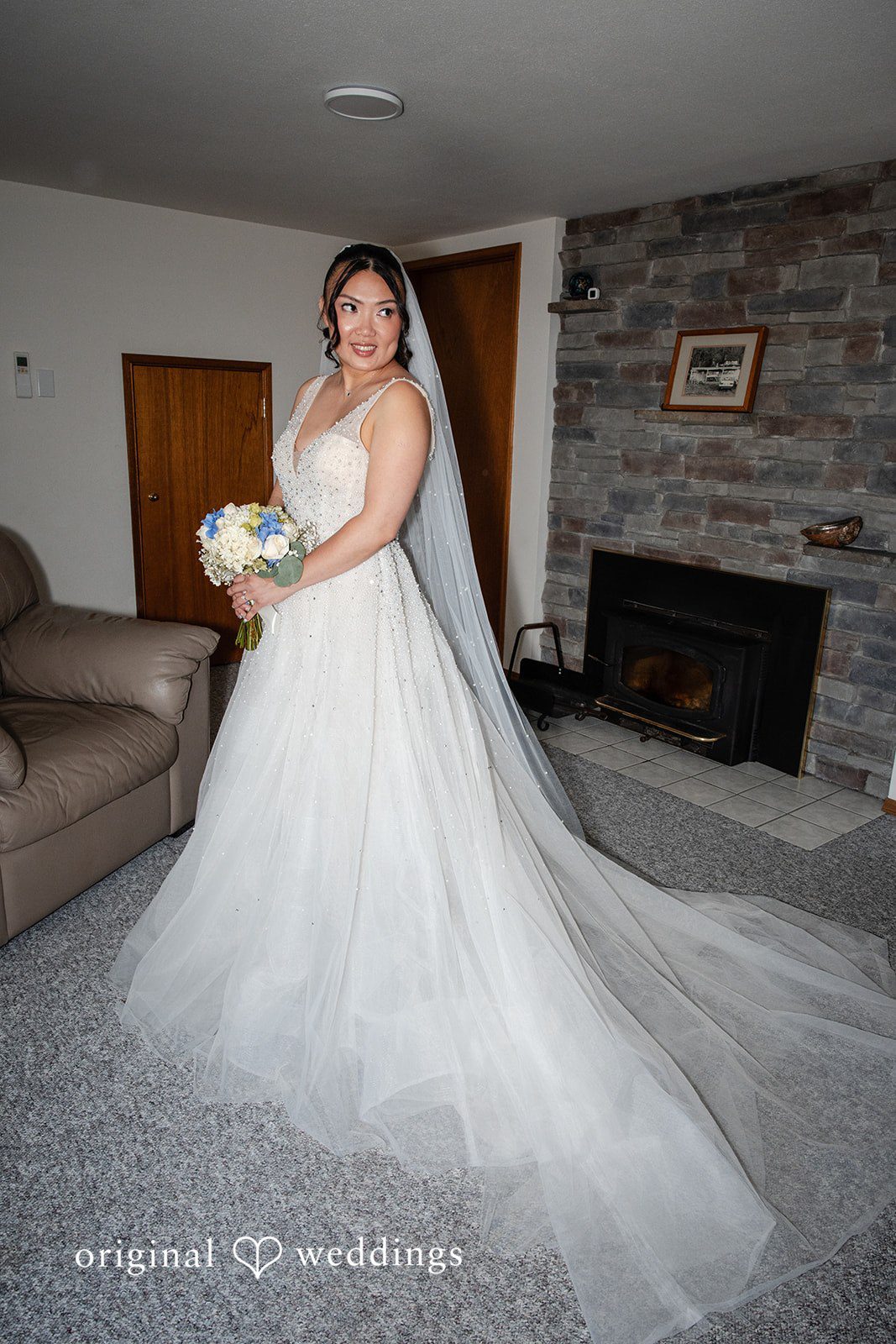 Kelly + John Bride getting ready indoors