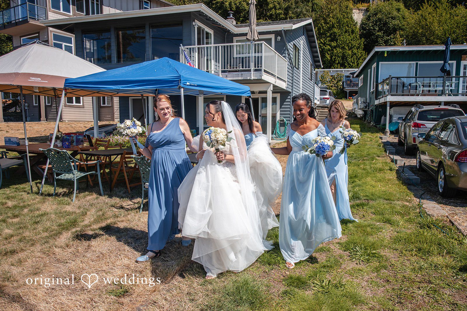 Kelly + John Bride with her bridesmaids in the backyard