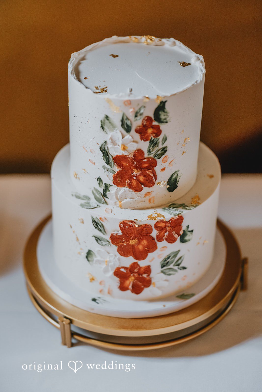 Benjamin + Tuan Wedding cake painted with orange and red flowers