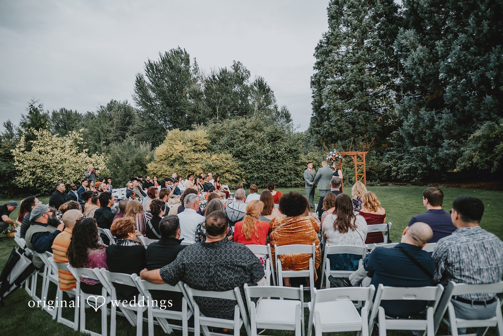 Benjamin + Tuan Guests seated for the garden ceremony at McMenamins Edgefield