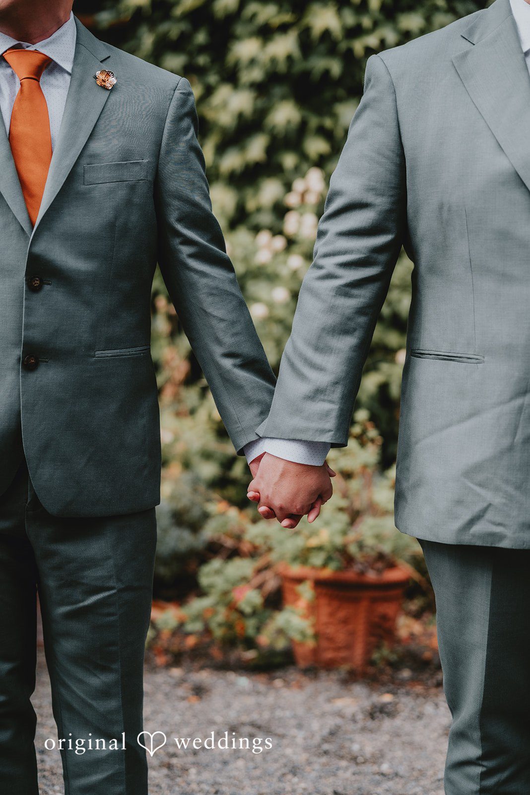 Benjamin + Tuan Close up of the couple holding hands